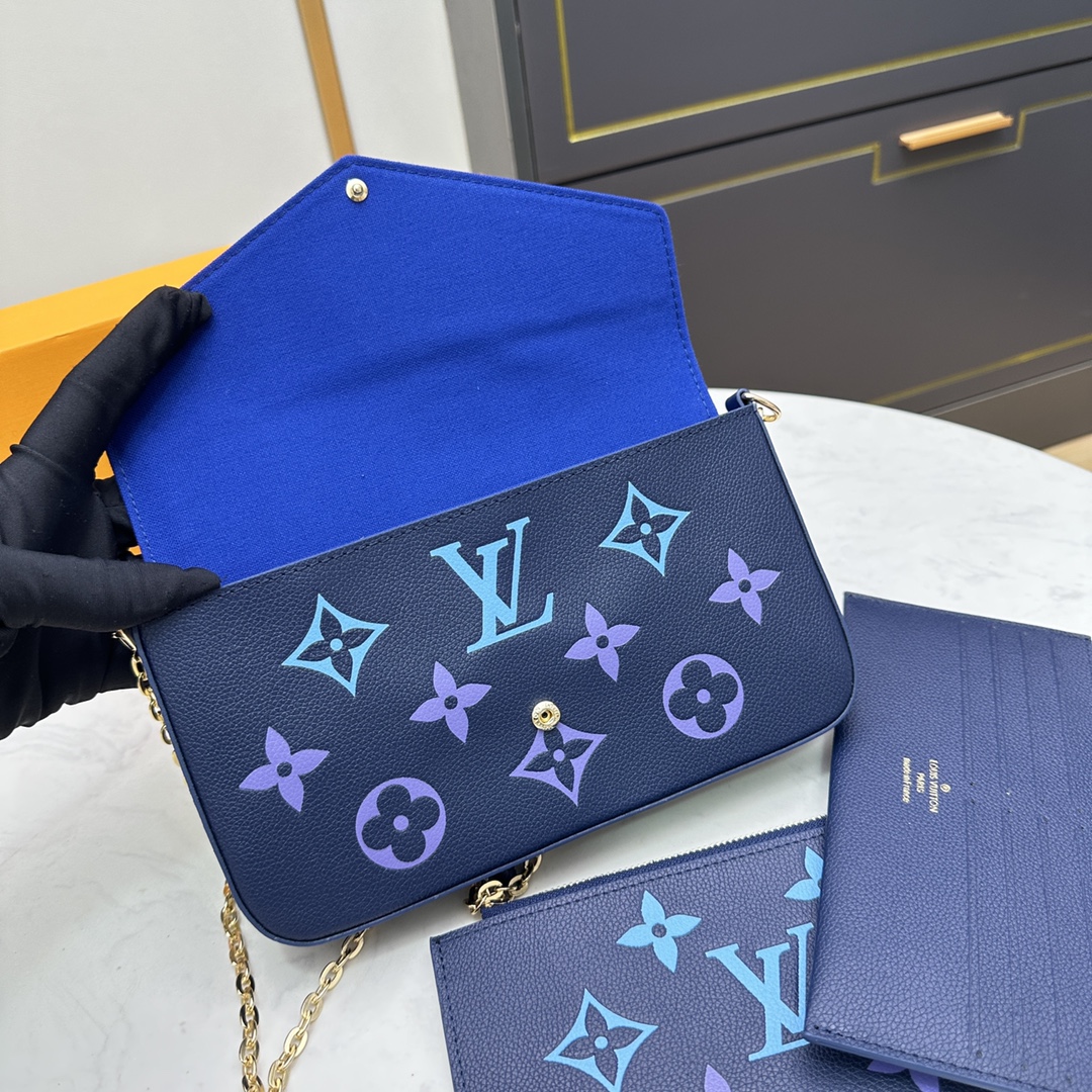 Leather wallet held as clutch