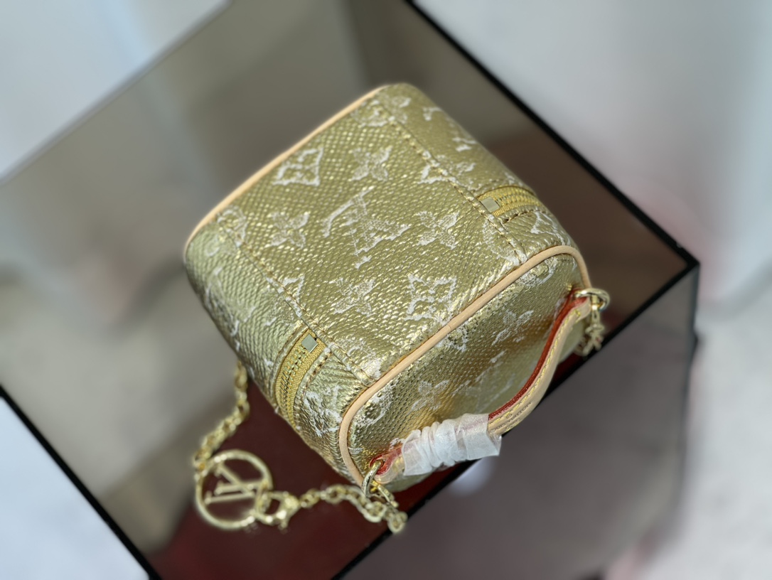 this Micro Vanity bag features a specialized coating that imparts a - Bag 5