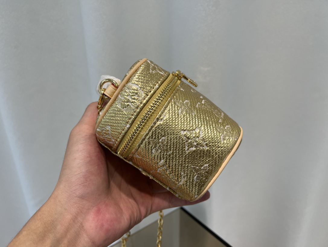 this Micro Vanity bag features a specialized coating that imparts a - Bag 3