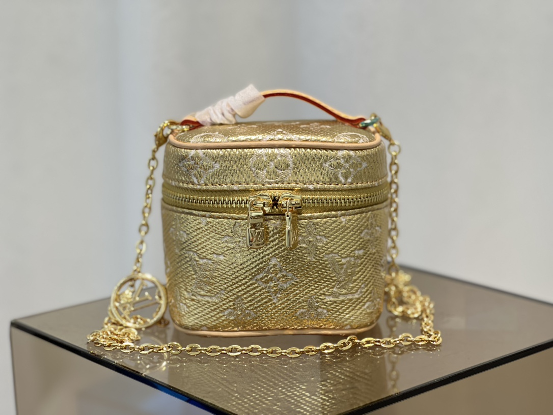 this Micro Vanity bag features a specialized coating that imparts a - Bag