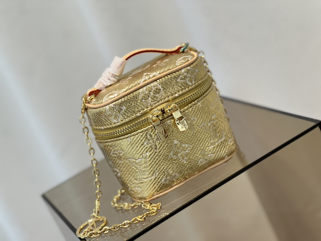this Micro Vanity bag features a specialized coating that imparts a - Bag 2