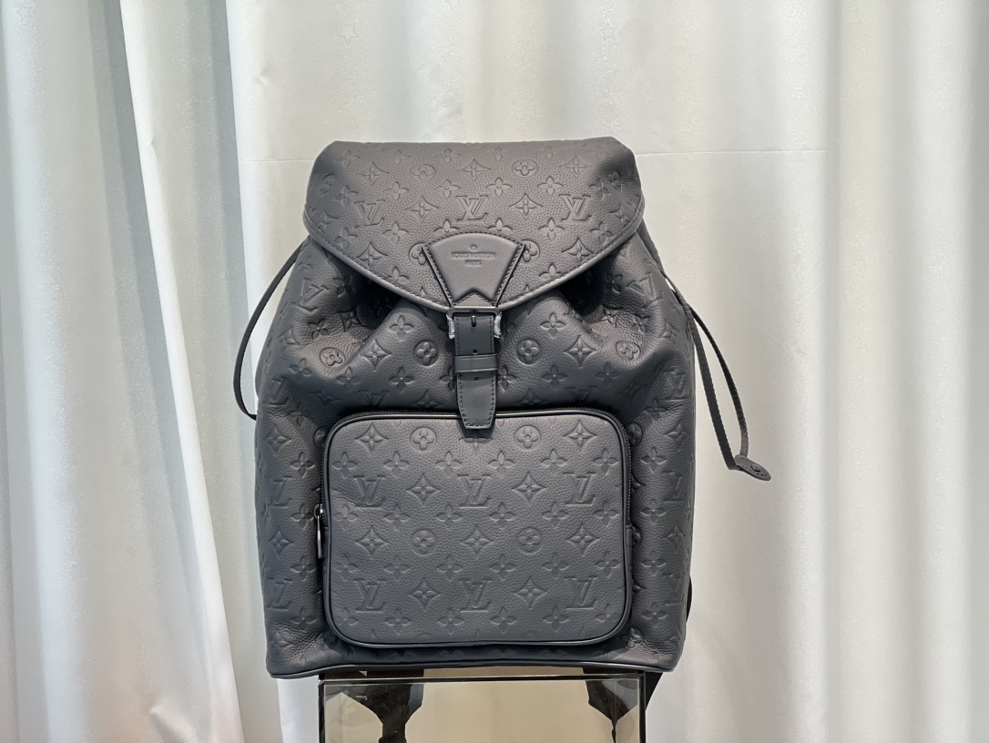 A zipped front pocket allows easy access to daily essentials, while a - Bag