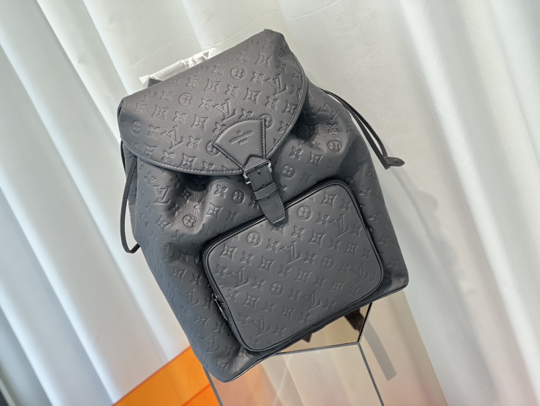 A zipped front pocket allows easy access to daily essentials, while a - Bag 2
