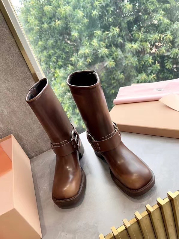 MiuMiu Perfecto
 Botas largas Cuero de vaca Colección otoño – invierno Vintage