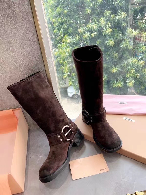 MiuMiu Alto
 Botas largas Cuero de vaca Colección otoño – invierno Vintage