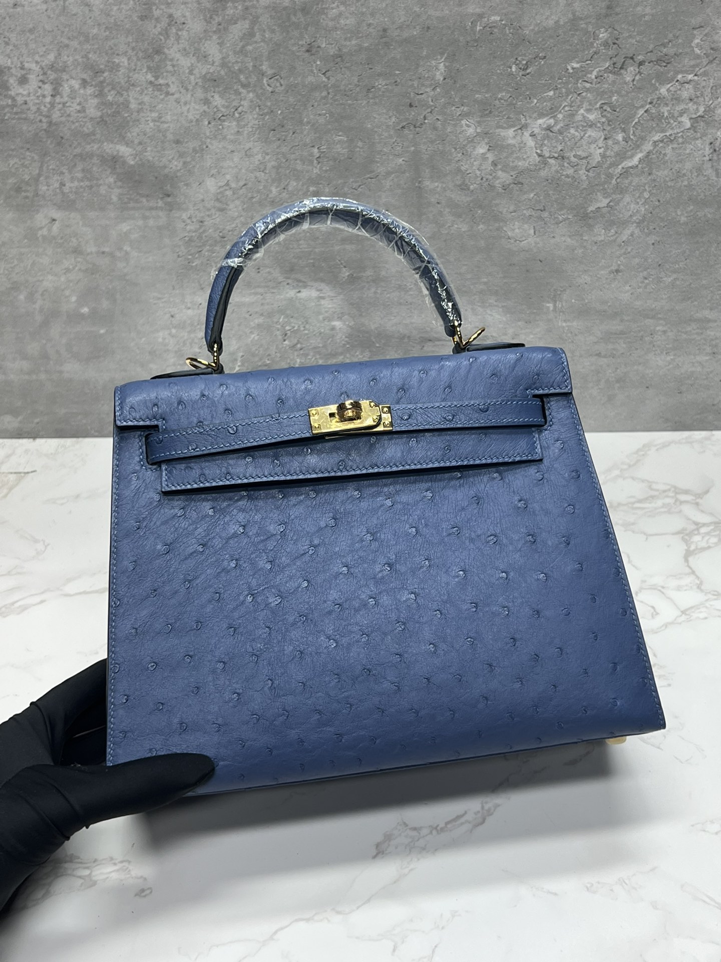 Kelly 25, azul brillante... piel de avestruz