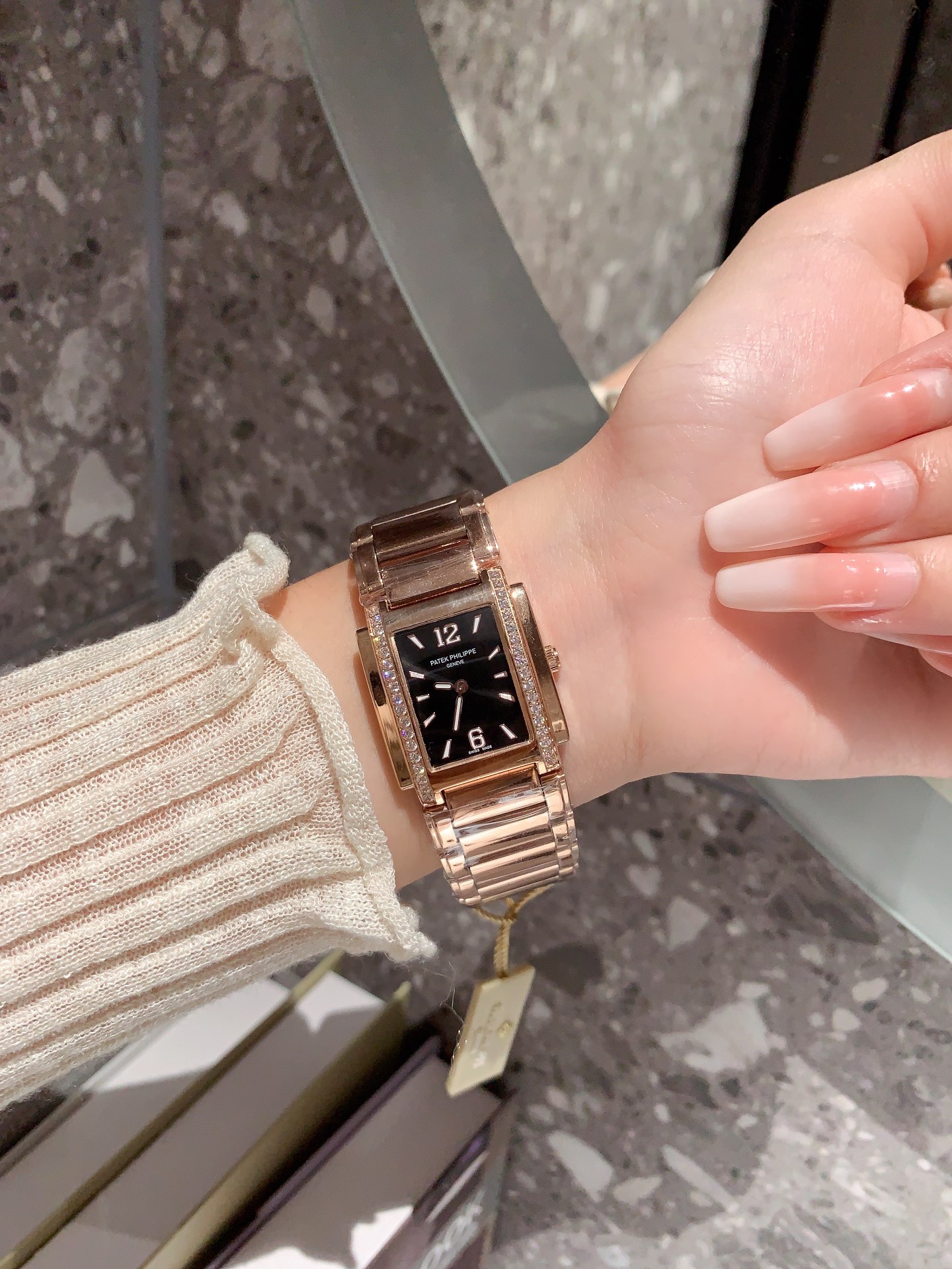 Luxurious Prada Emerald Twenty-4 Watch with Diamond Detailing and Night-Light Compass.