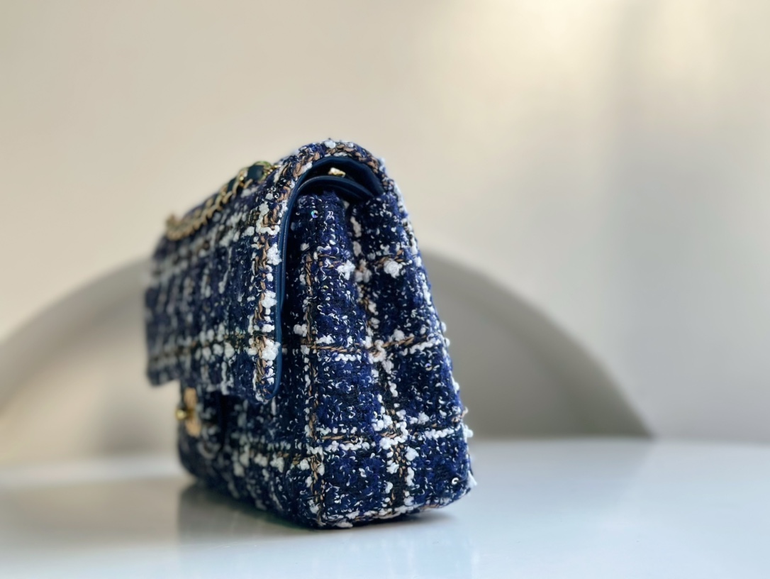 CHANEL 23P handmade woolen CF. Limited edition. Very popular with celebrities and bloggers. Can be worn on one shoulder and cross-body. Practical