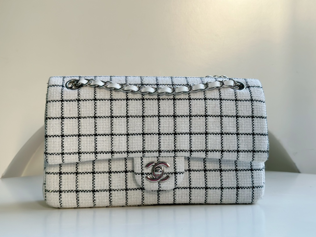 CHANEL 23P handmade plaid cloth bag CF. Limited edition, hard to come by. Very popular with celebrities and bloggers. Can be worn on one shoulder