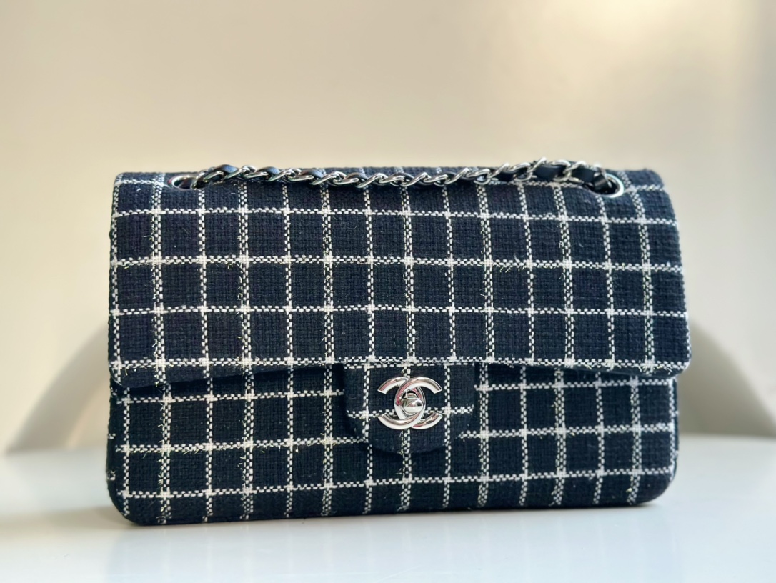 CHANEL 23P handmade plaid bag with CF lambskin lining. Limited edition. Very popular with celebrities and bloggers. Can be worn on one shoulder a