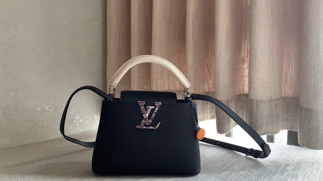 Louis Vuitton 94048 black with white lizard pattern