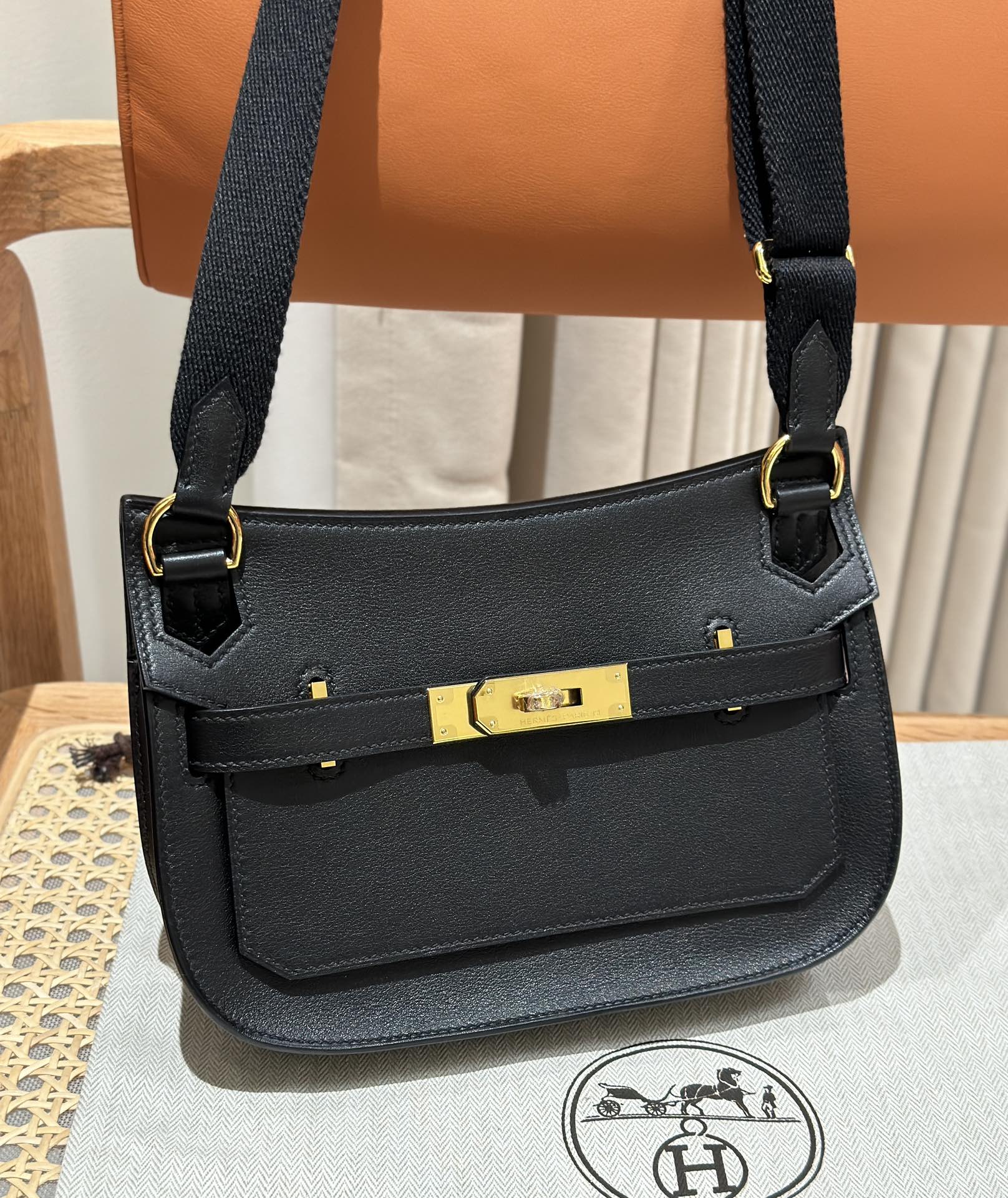 Hermès Mini Jypsiere Black Swift Leather Crossbody Bag with Gold Hardware 2 i1692254815 7891 1