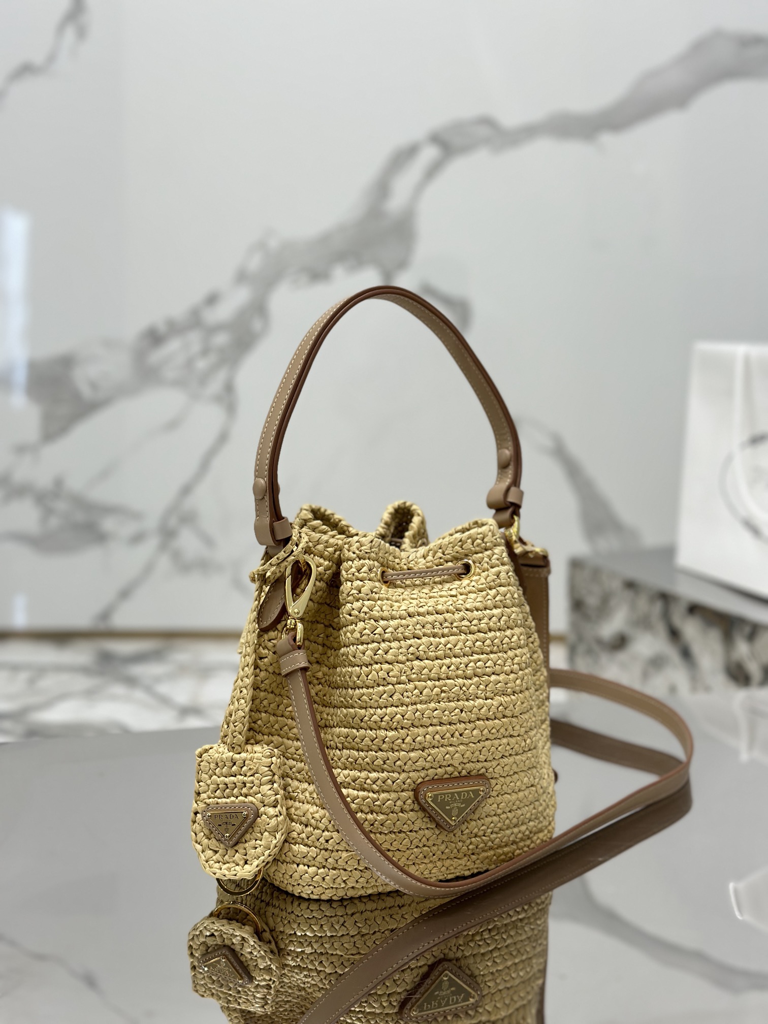 Prada Rare counter edition woven drawstring bucket bag