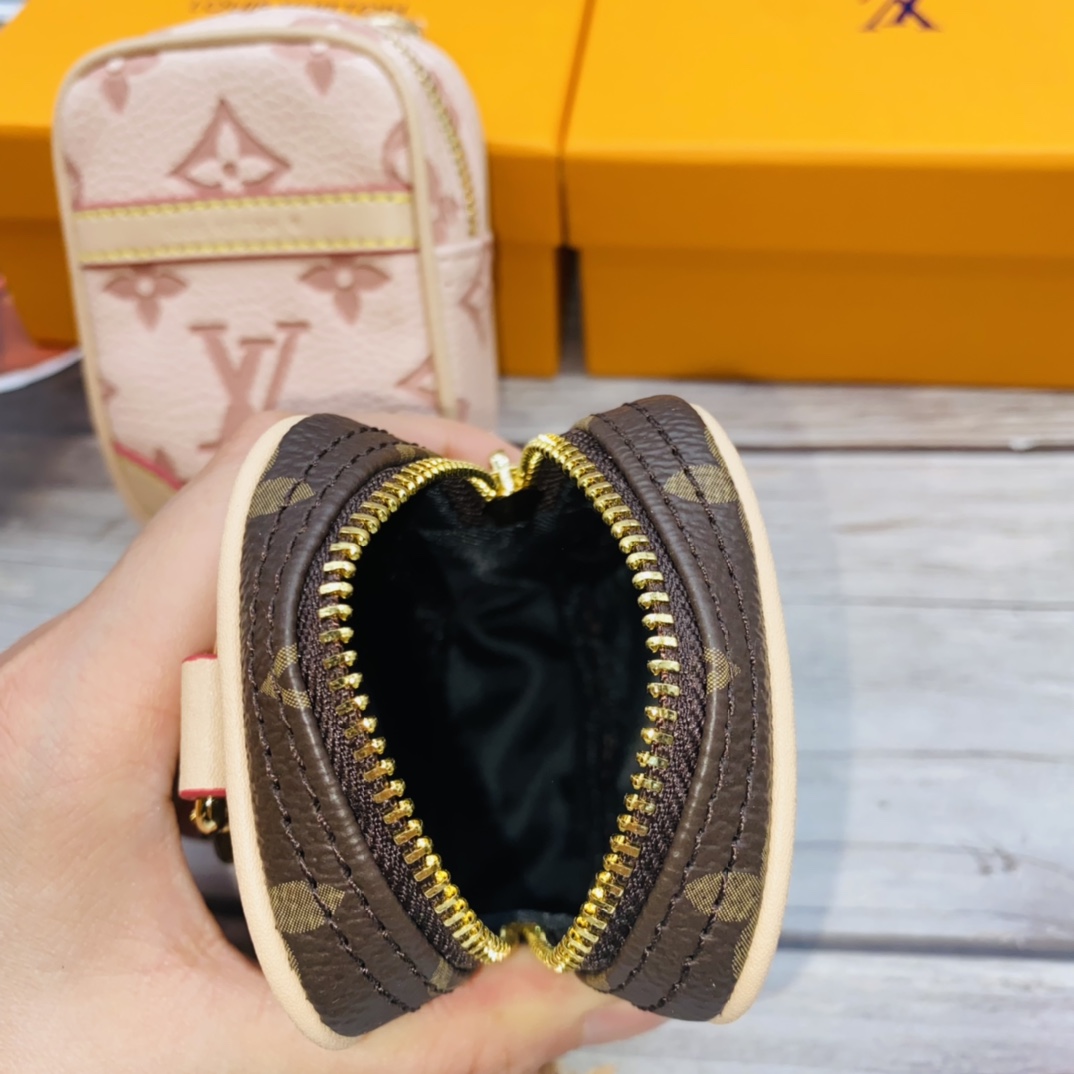 Luxury mini leather handbag worn as a crossbody