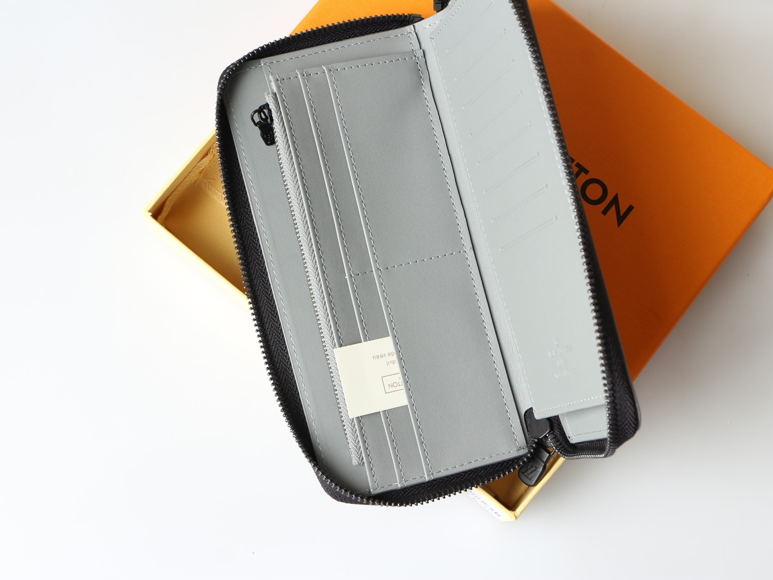 Leather wallet held in hand