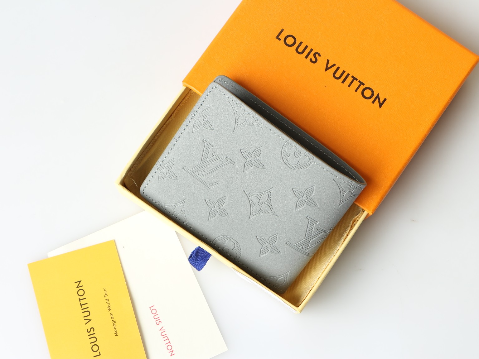 Wallet in hand showing its size