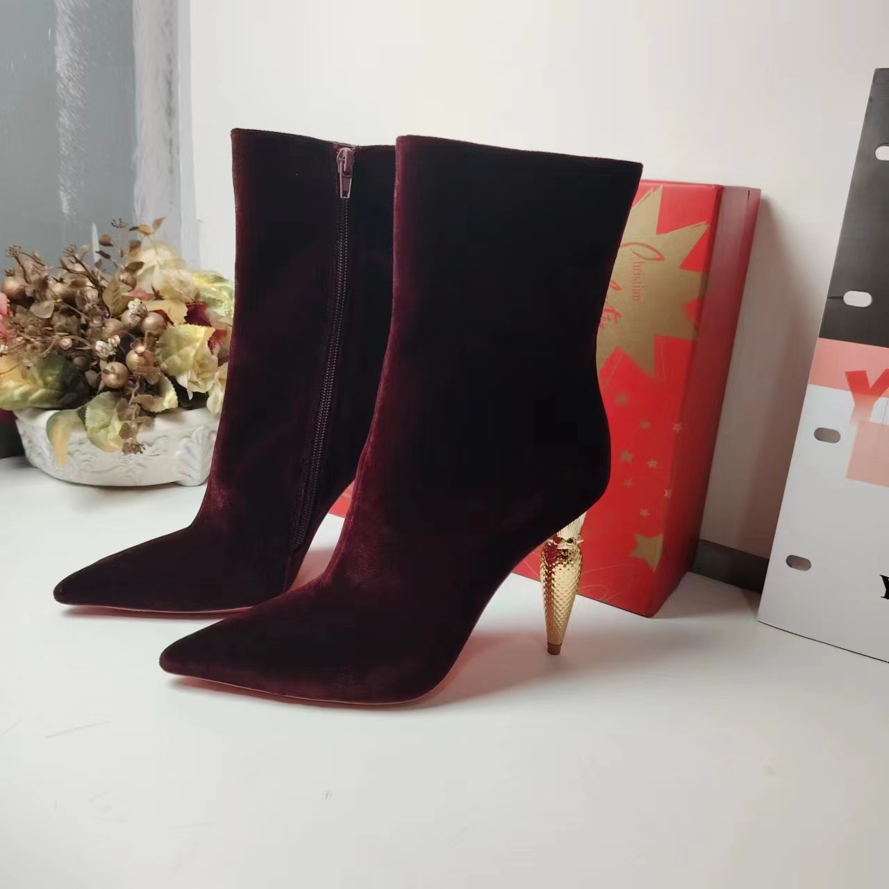 Glamorous Golden Heel: Egyptian-Inspired Velvet Boots in Black and Wine Red