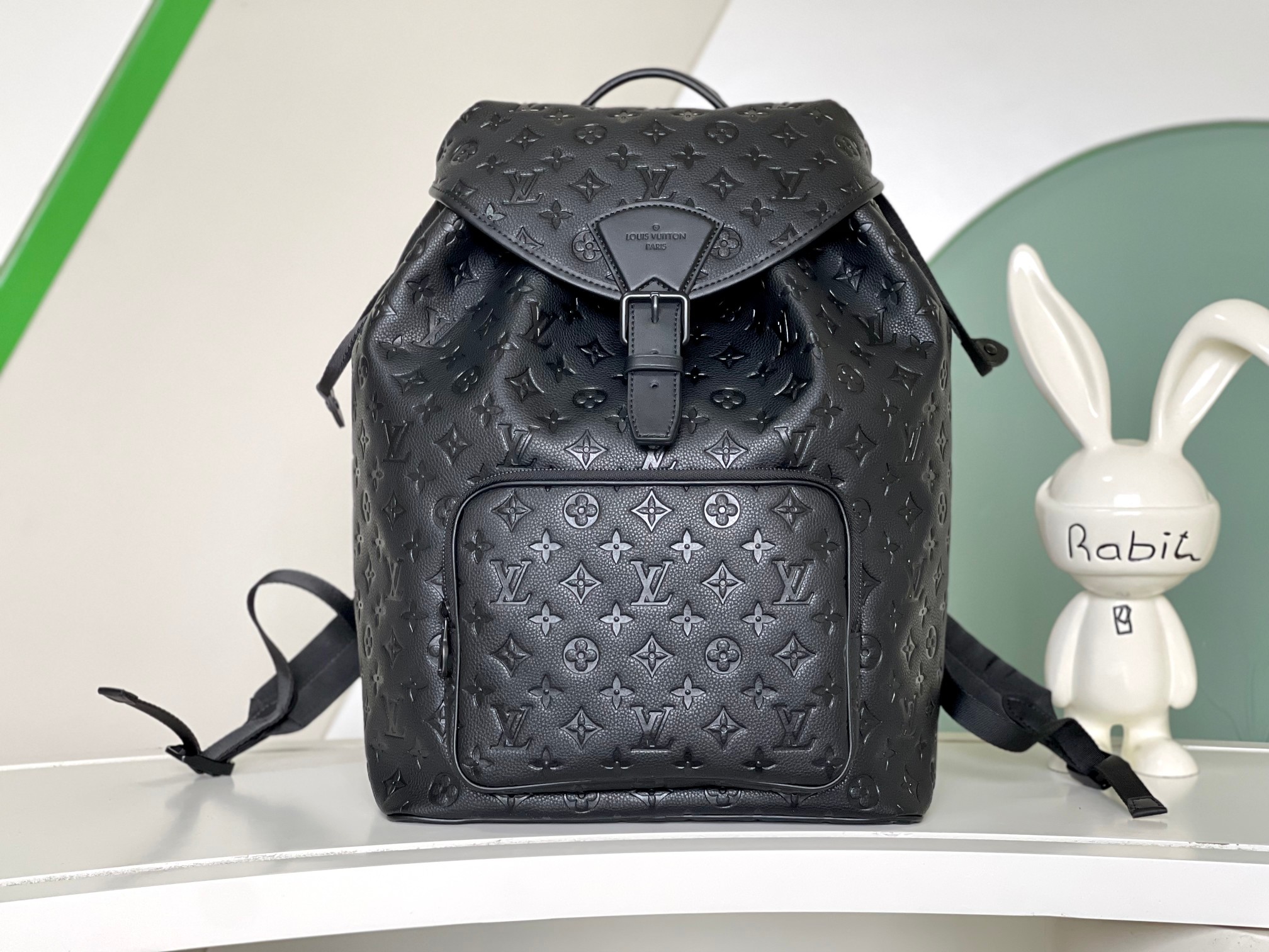 A zipped front pocket allows convenient access to daily essentials - Bag