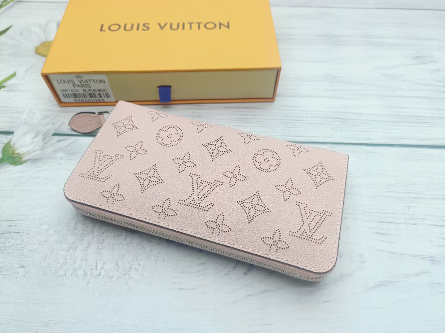 Women holding leather wallet