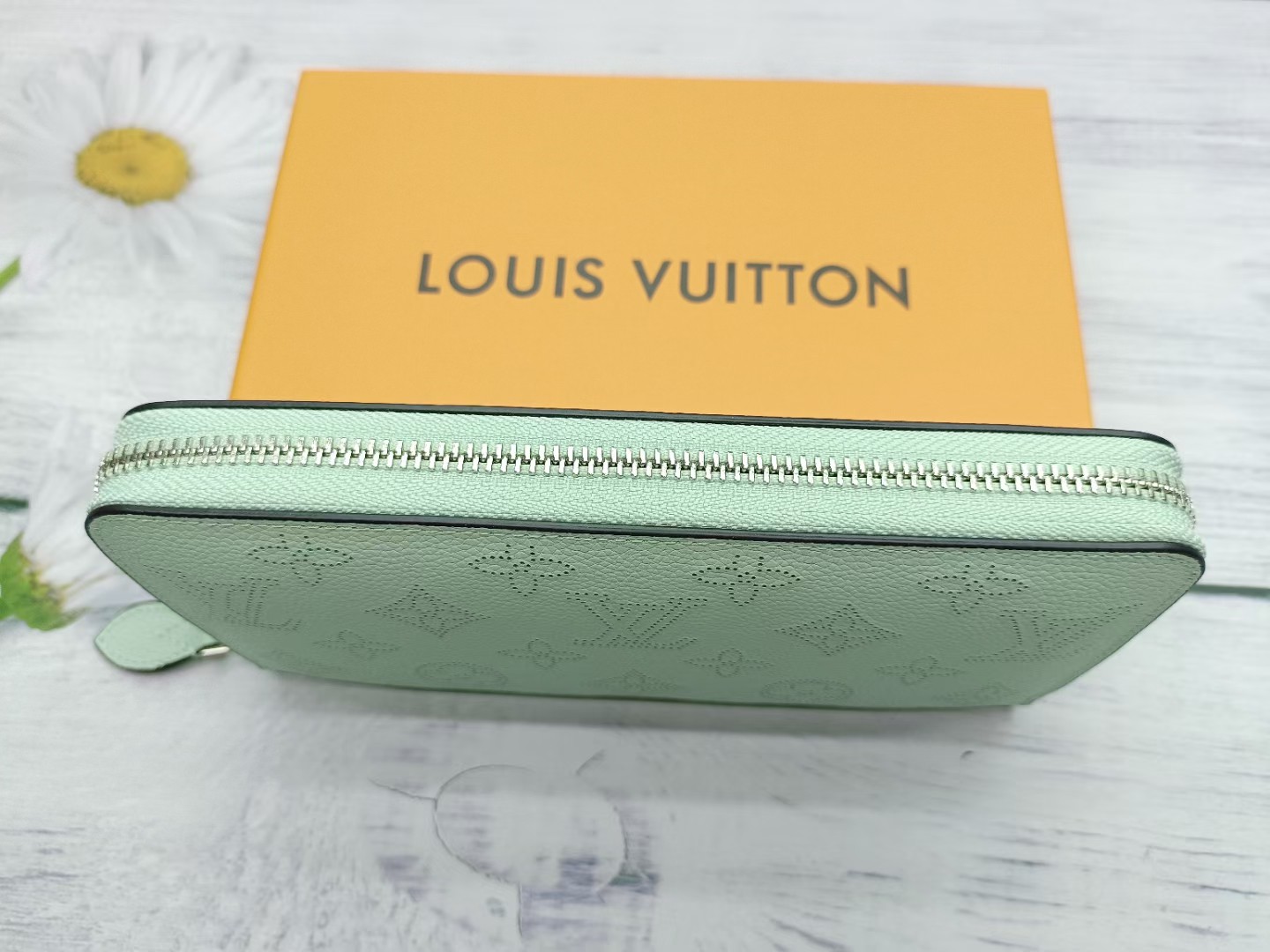 Long leather wallet in hand