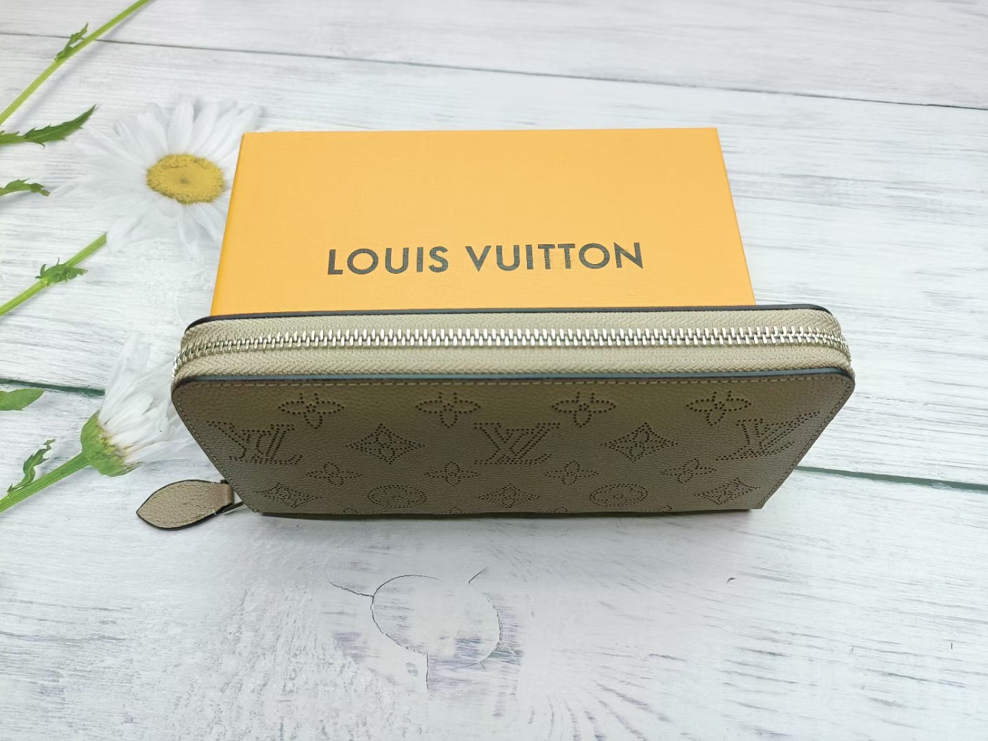 Long leather wallet in hand