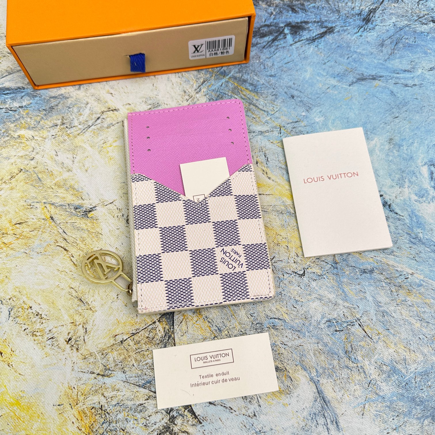 Leather wallet together with other leather goods.