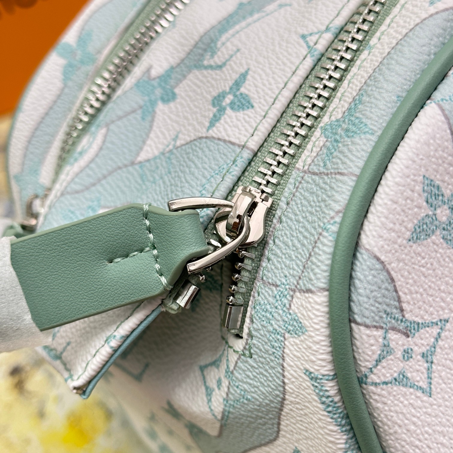 The leather wash bag in a bathroom or hotel environment.