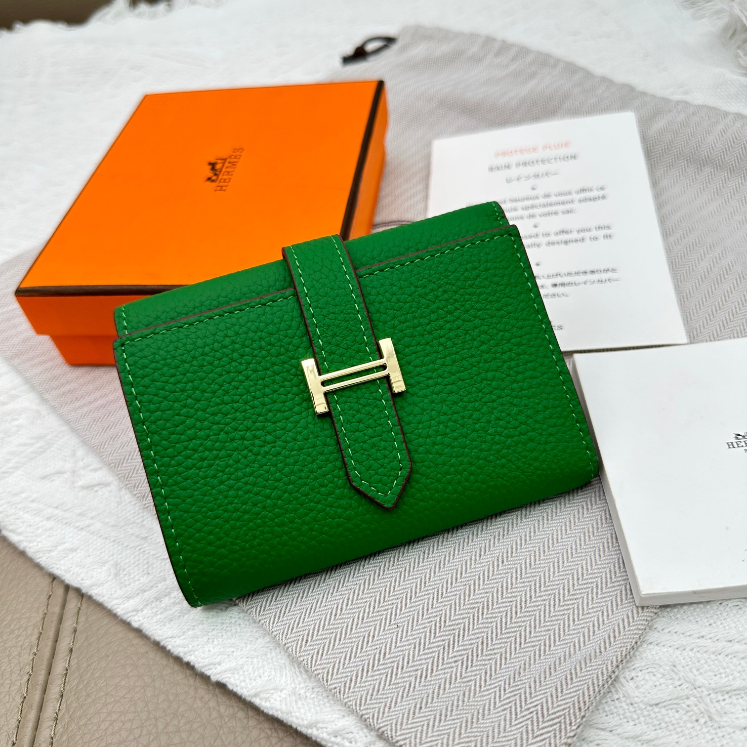 Hermes Togo Leather Tri-Fold Wallet with Gold Hardware - Compact & Stylish
