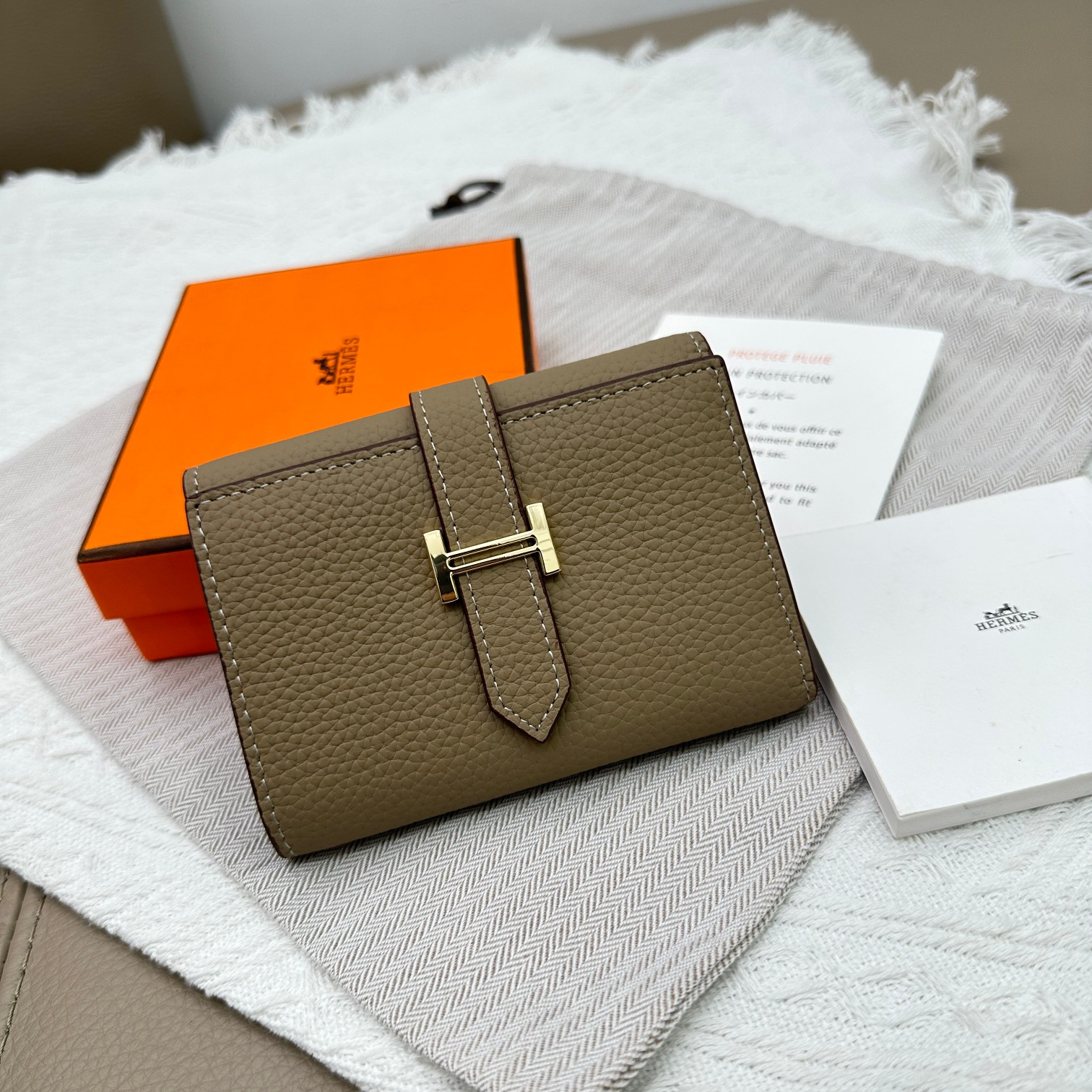 Hermes Togo Leather Tri-Fold Wallet with Gold Hardware - Compact & Stylish