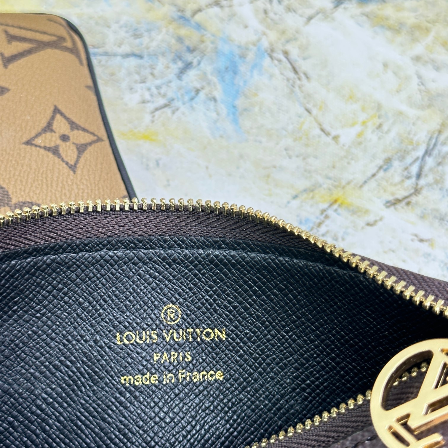 Leather wallet together with other leather goods.