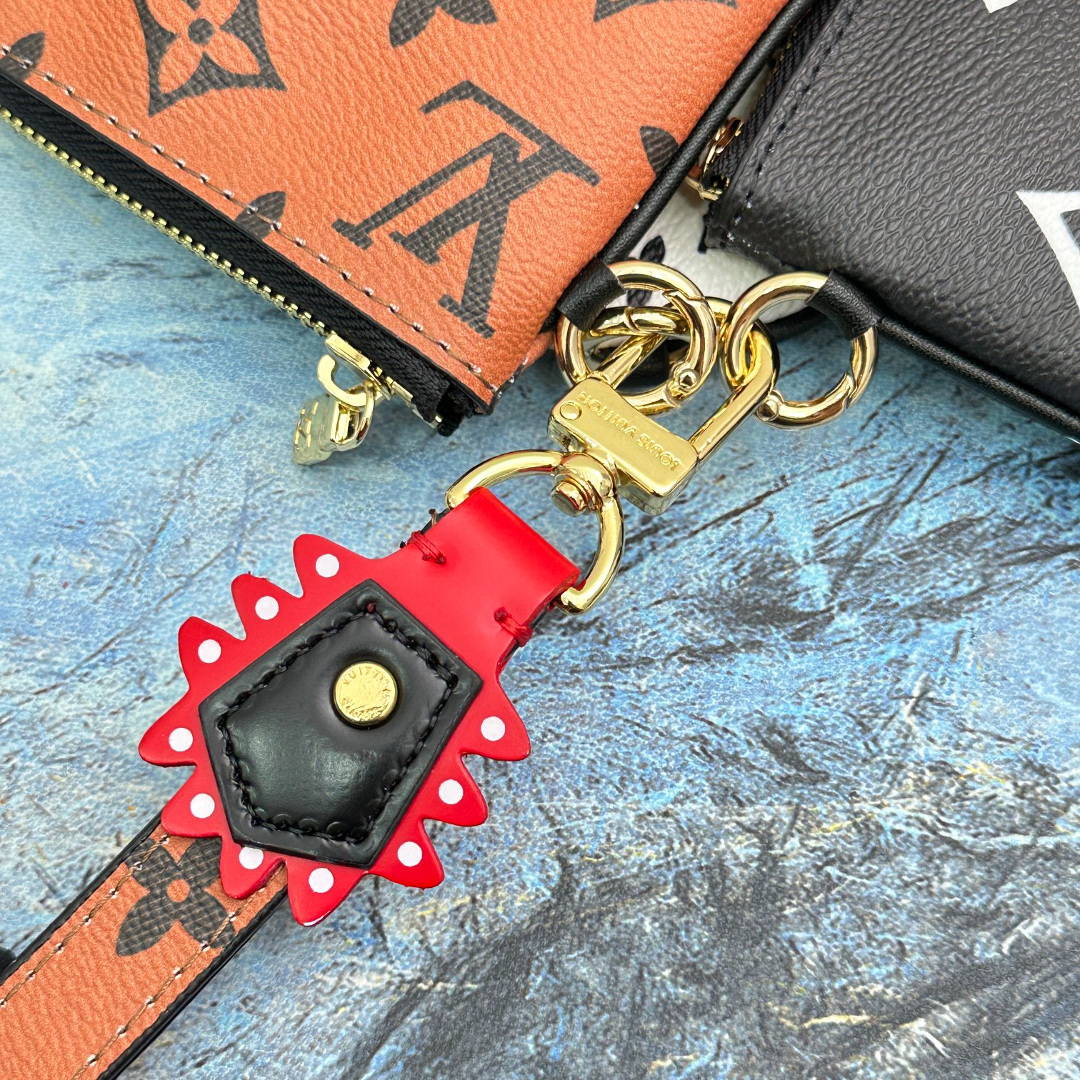 The leather wallet in a pocket, or being used at a shop.