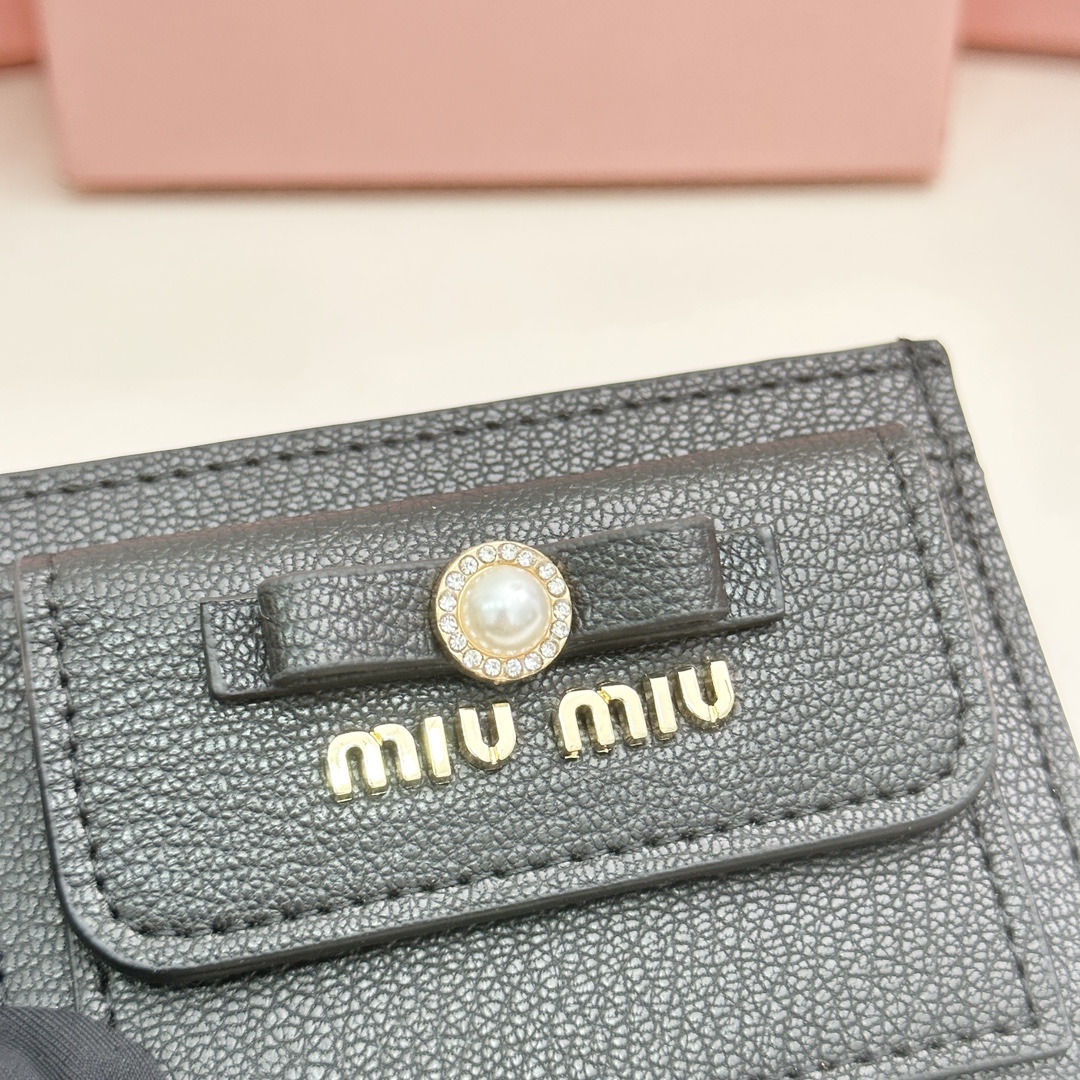 Brand:** Miu Miu - Comprehensive 5