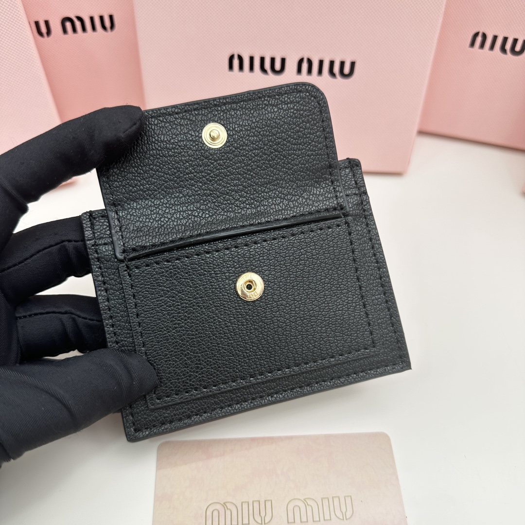 Brand:** Miu Miu - Comprehensive 9