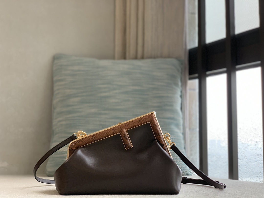 Fendi First series small handbag, lambskin, decorated with oversized F metal buckle, covered with luxurious python skin of the same color. The in