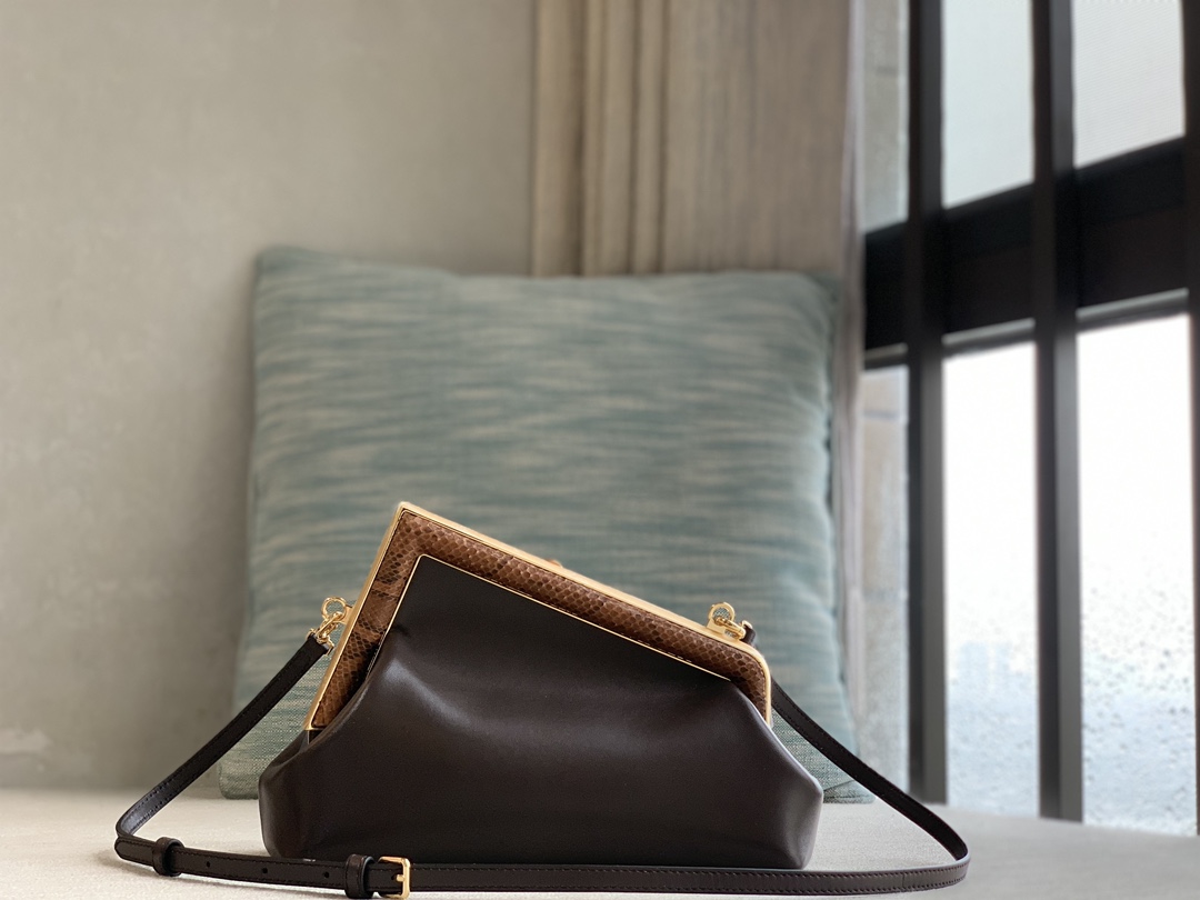 Fendi First series small handbag, lambskin, decorated with oversized F metal buckle, covered with luxurious python skin of the same color. The in