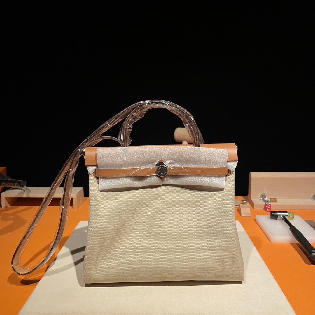 Hermès Herbag inseam 31 canvas and leather, glacier white and 34 original colors, silver buckle