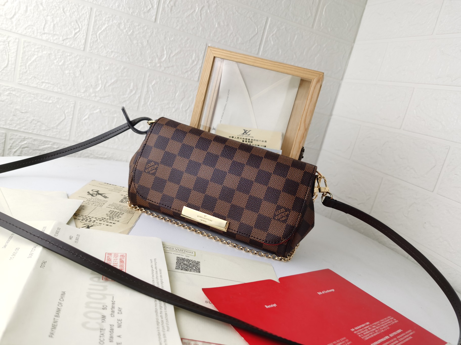 モノグラムキャンバスのコンパクトハンドバッグ