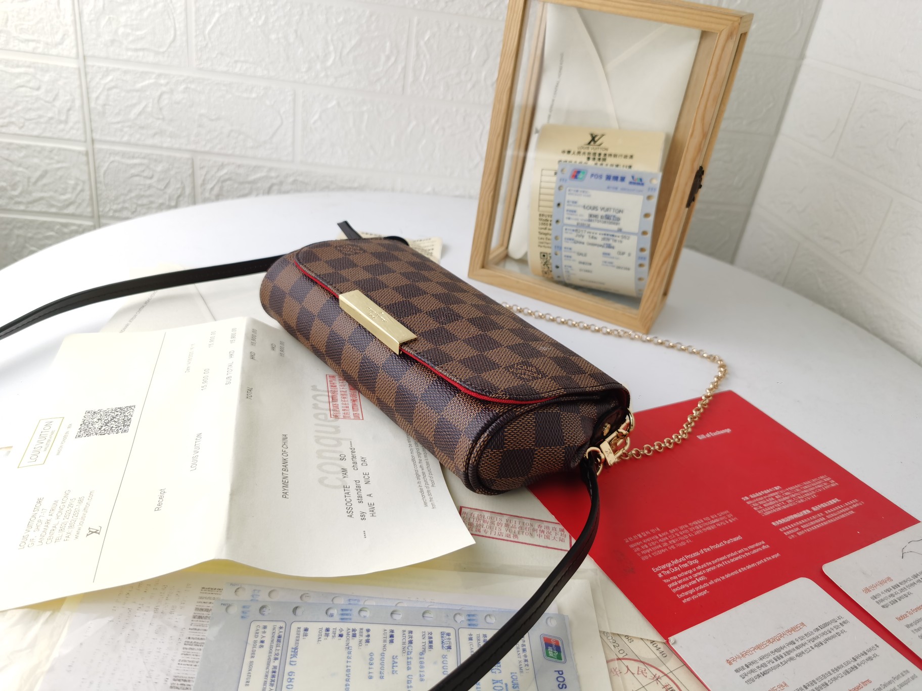 モノグラムキャンバスのコンパクトハンドバッグ