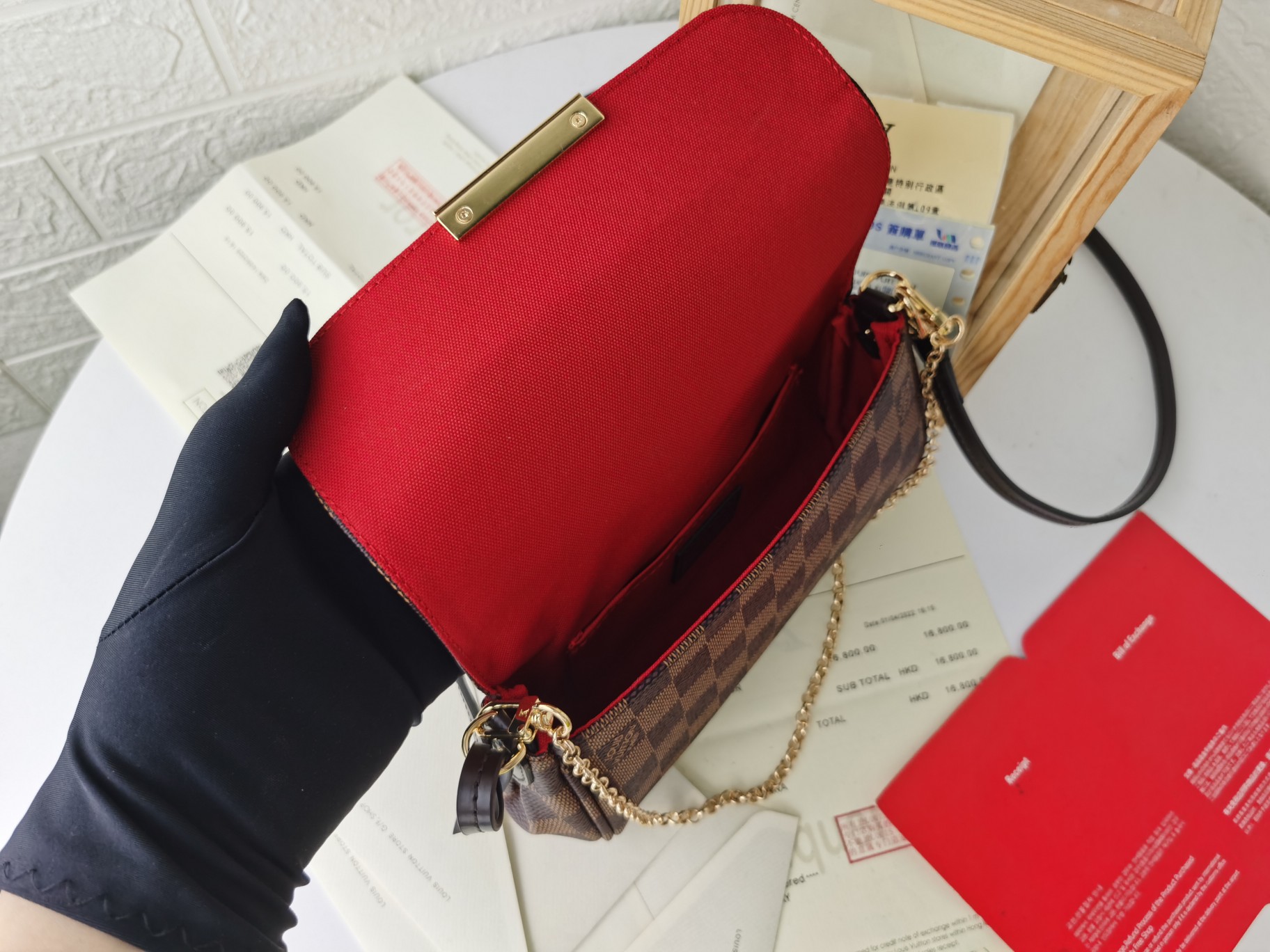 モノグラムキャンバスのコンパクトハンドバッグ