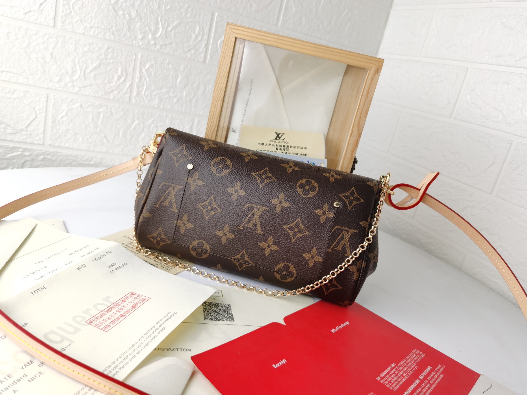 Monogram帆布製小型手袋 - クラシックで便利なデザイン