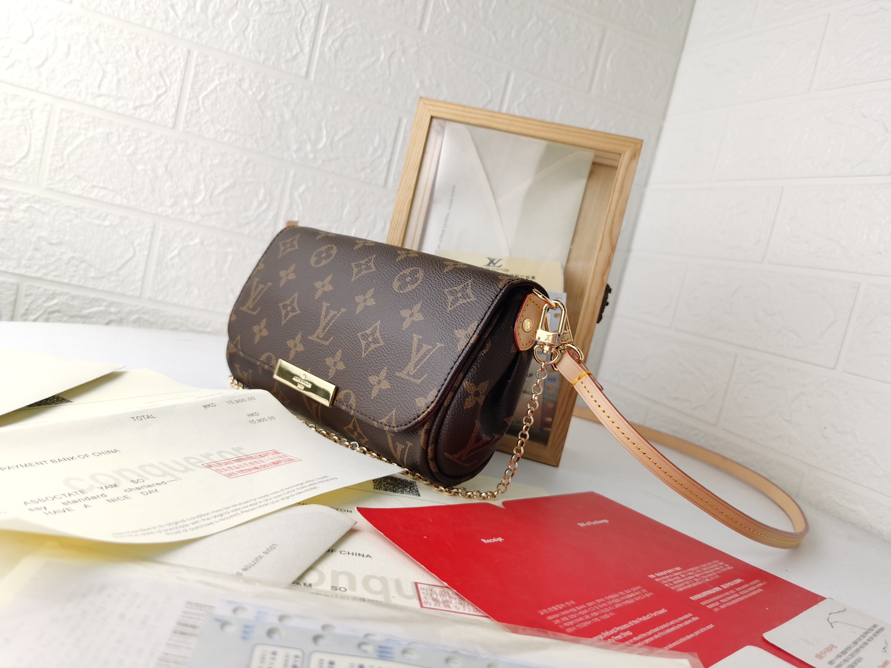 Monogram帆布製小型手袋 - クラシックで便利なデザイン