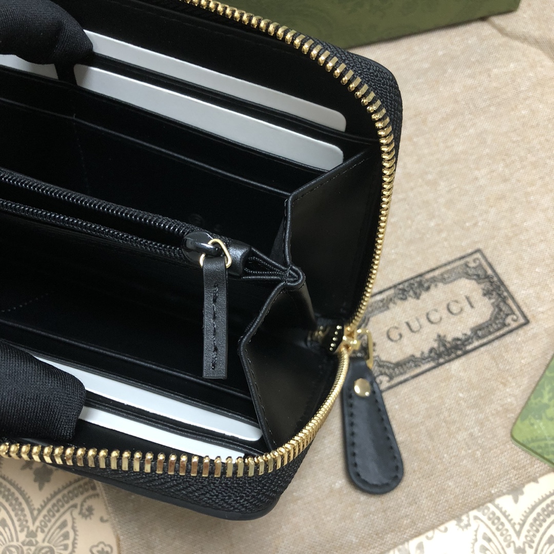 Gucci Signature黑色进口小牛皮拉链钱包，独特高雅的设计，配以热压技术，时尚潮流百搭，你值得