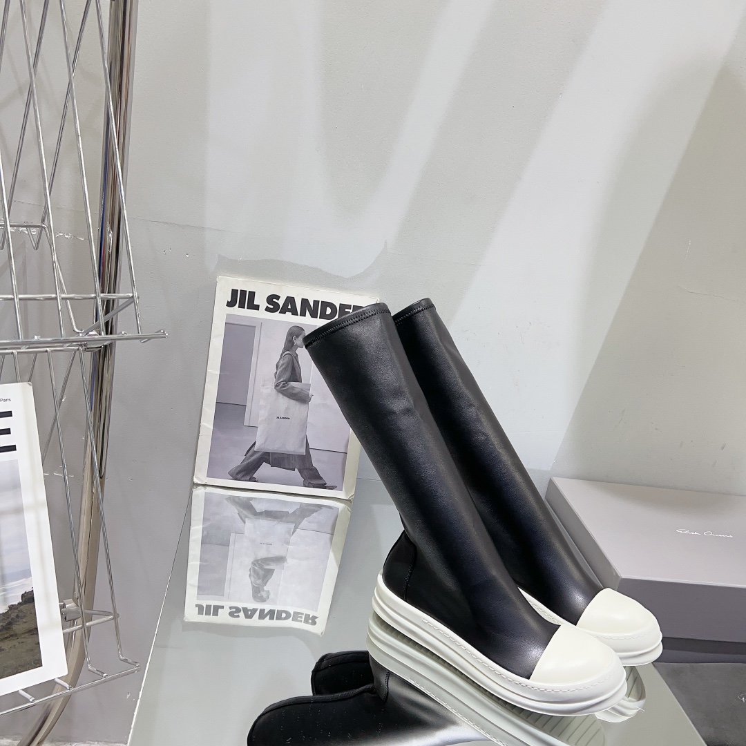 “High-Legged Rick Owens Boots: Spicy Style with TPU Cream Base”