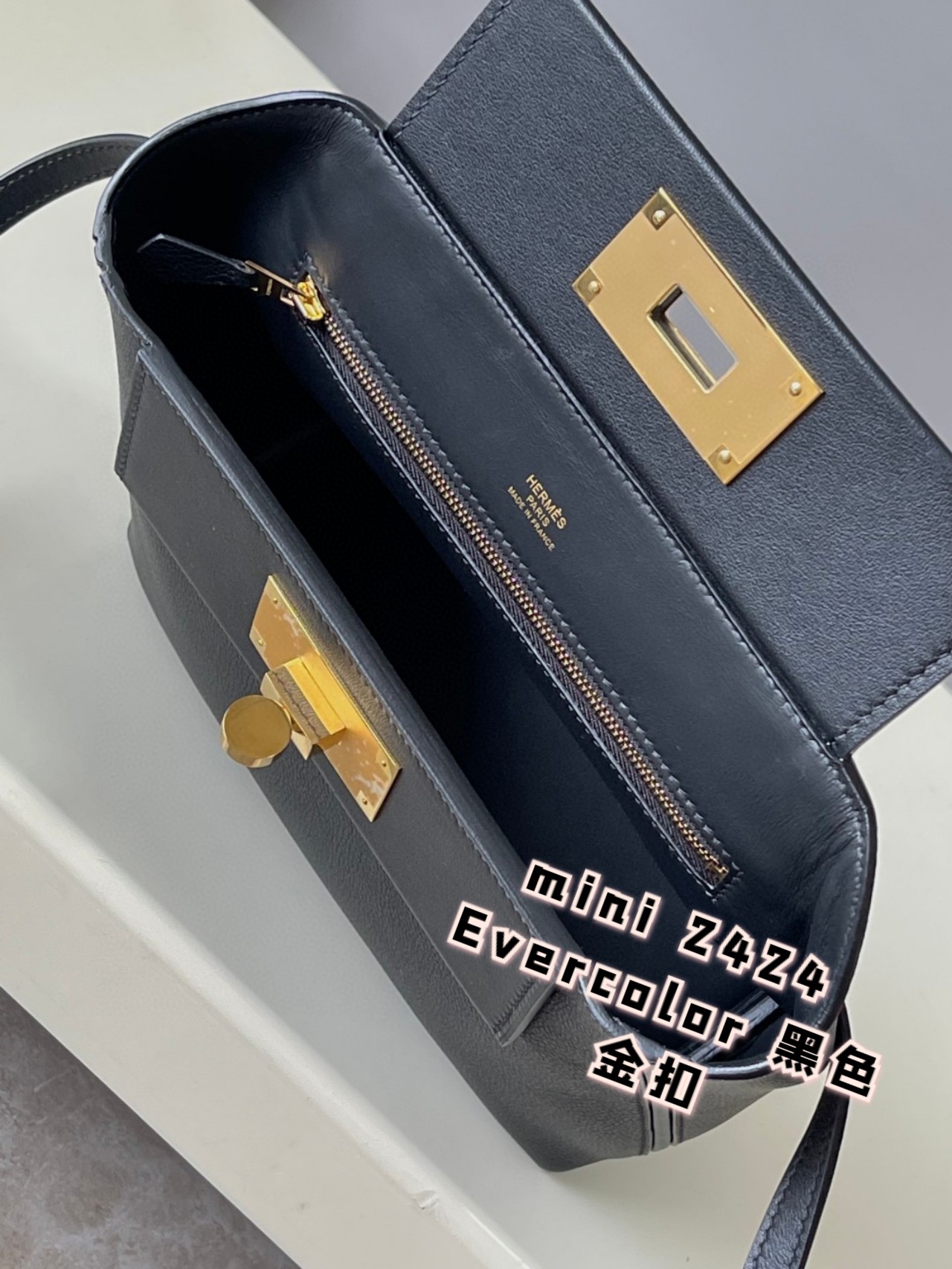 Hermès Mini 24/24 Evercolor Leather Handbag with Gold Hardware - Black 7 a1694602963146 4257