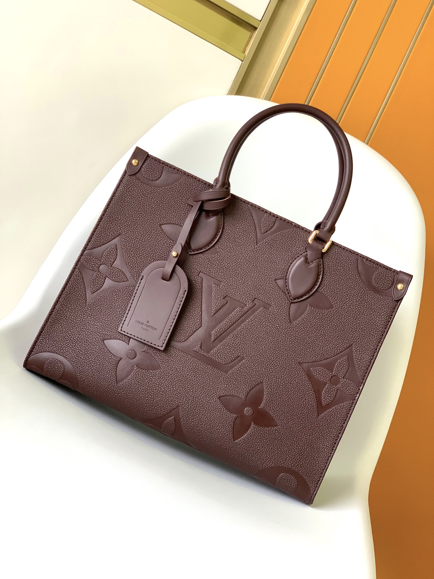 Louis Vuitton LV Onthego Tassen handtassen Abrikos kleur Zwart Maroonrood Rood Wit Empreinte​ Koeienhuid M46601