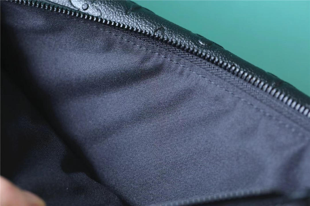 The Pochette S-Lock clutch is crafted from Monogram Eclipse canvas with - Bag 8