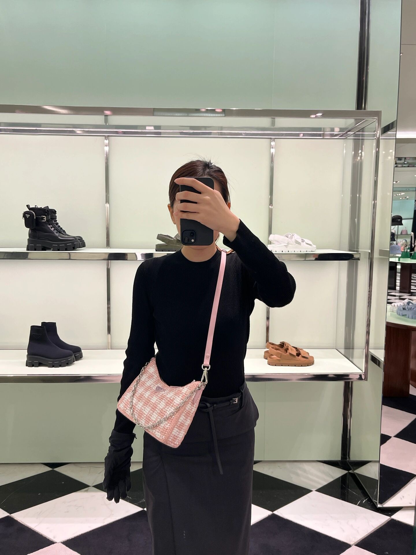 Prada Simple lines and woven handwork complement each other