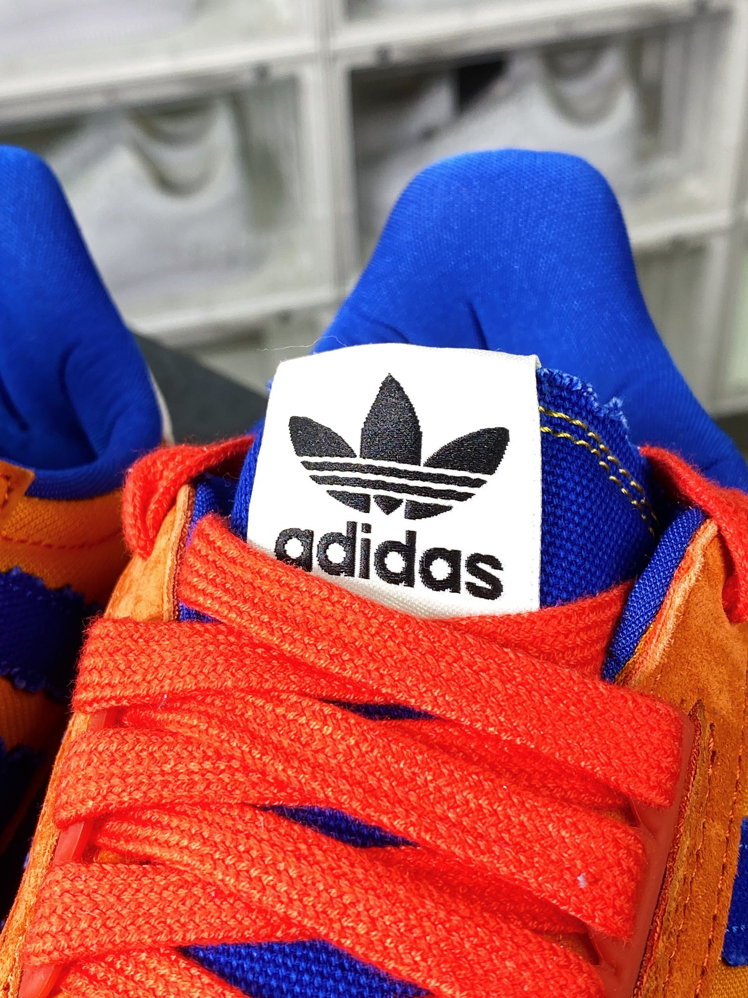 Adidas Originals ZX500 RM Boost ”SON GOKU” series low-top popcorn running shoes ”Jointly named orange and blue Sun Wukong” D97046