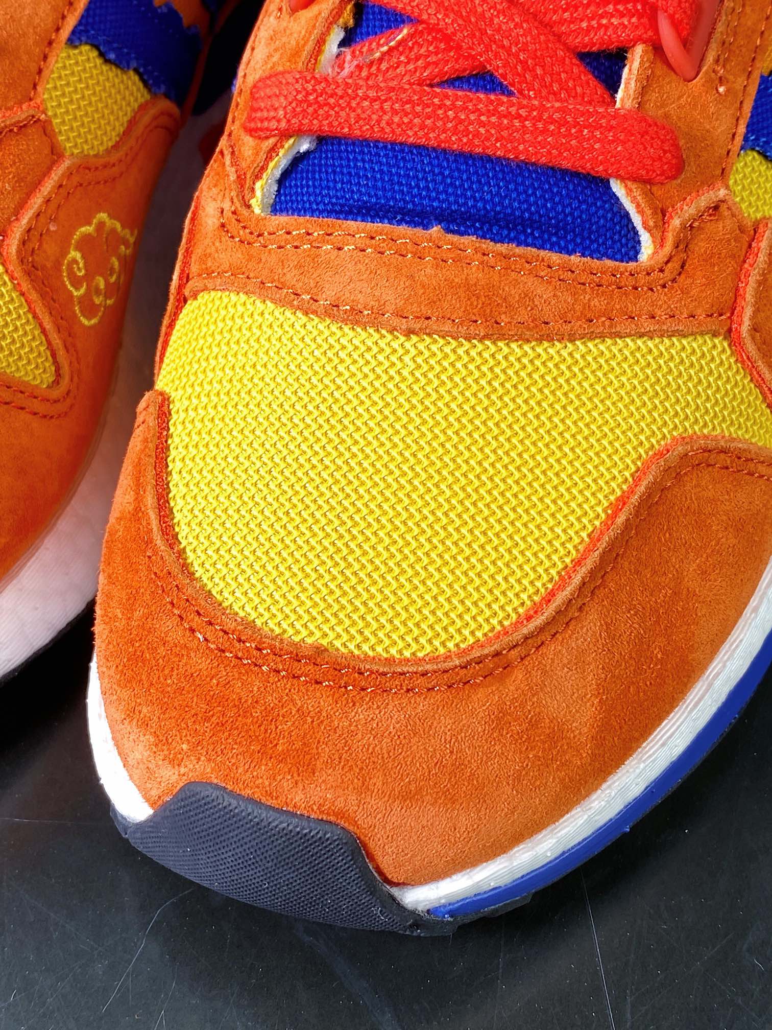 Adidas Originals ZX500 RM Boost ”SON GOKU” series low-top popcorn running shoes ”Jointly named orange and blue Sun Wukong” D97046