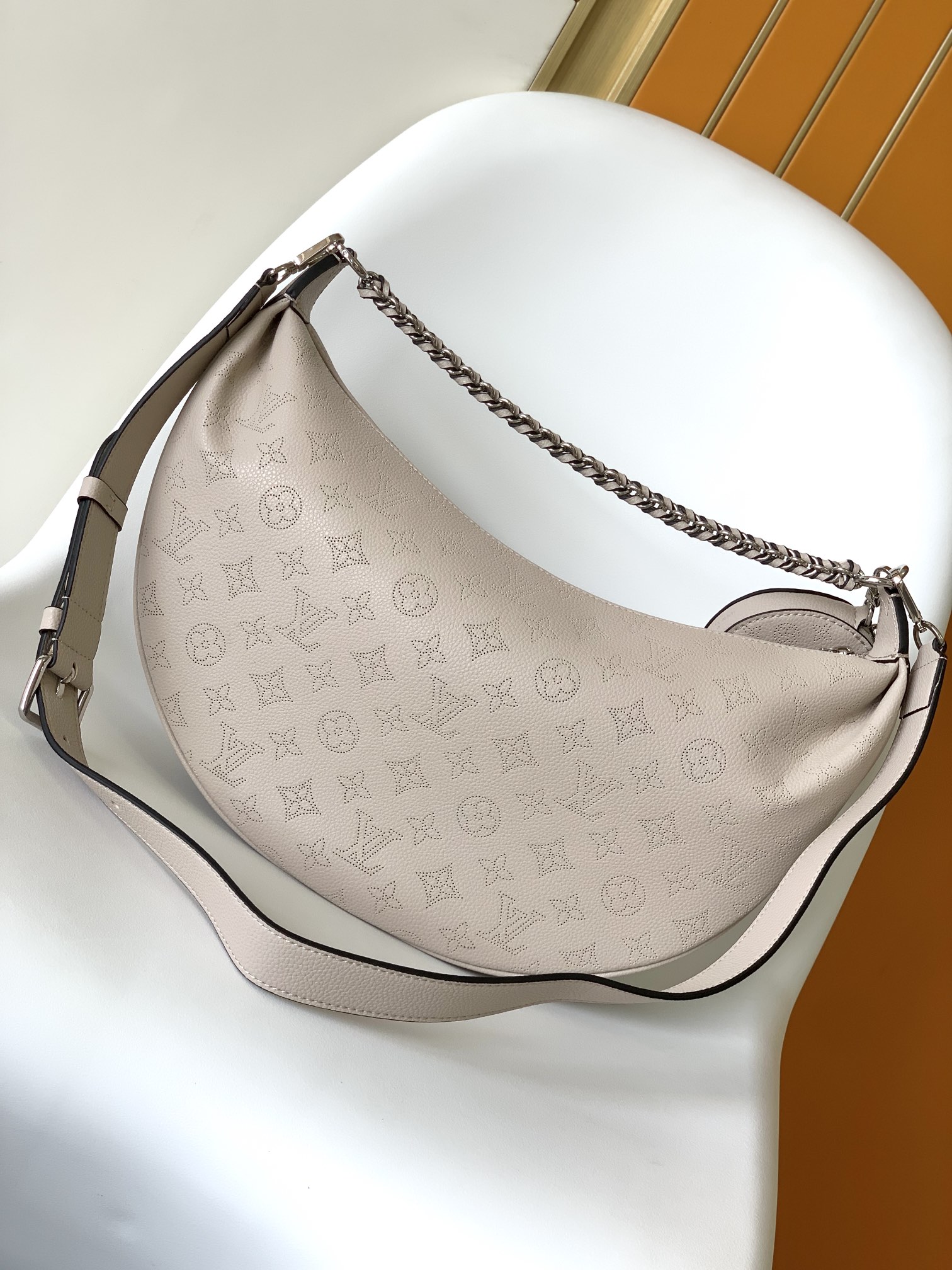 Louis Vuitton Baia Medium Handbag in Perforated Leather with Round Coin Purse 4 i1696566551 305 2